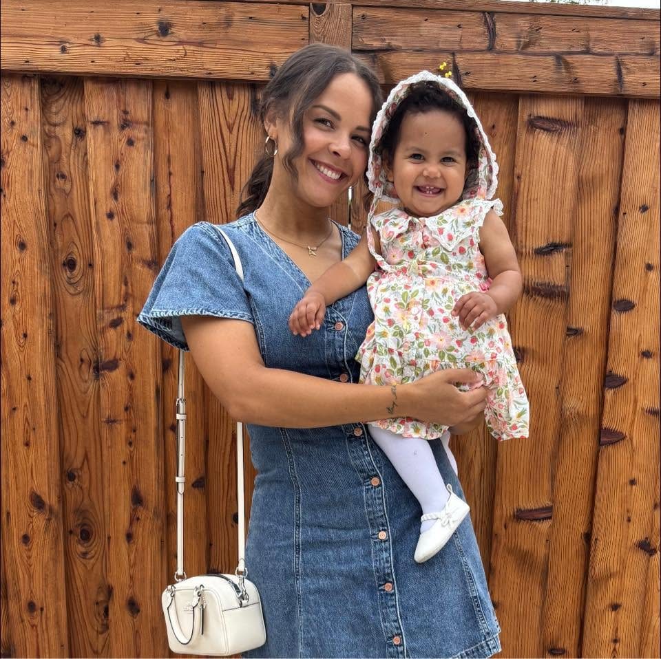 Annika holding her daughter